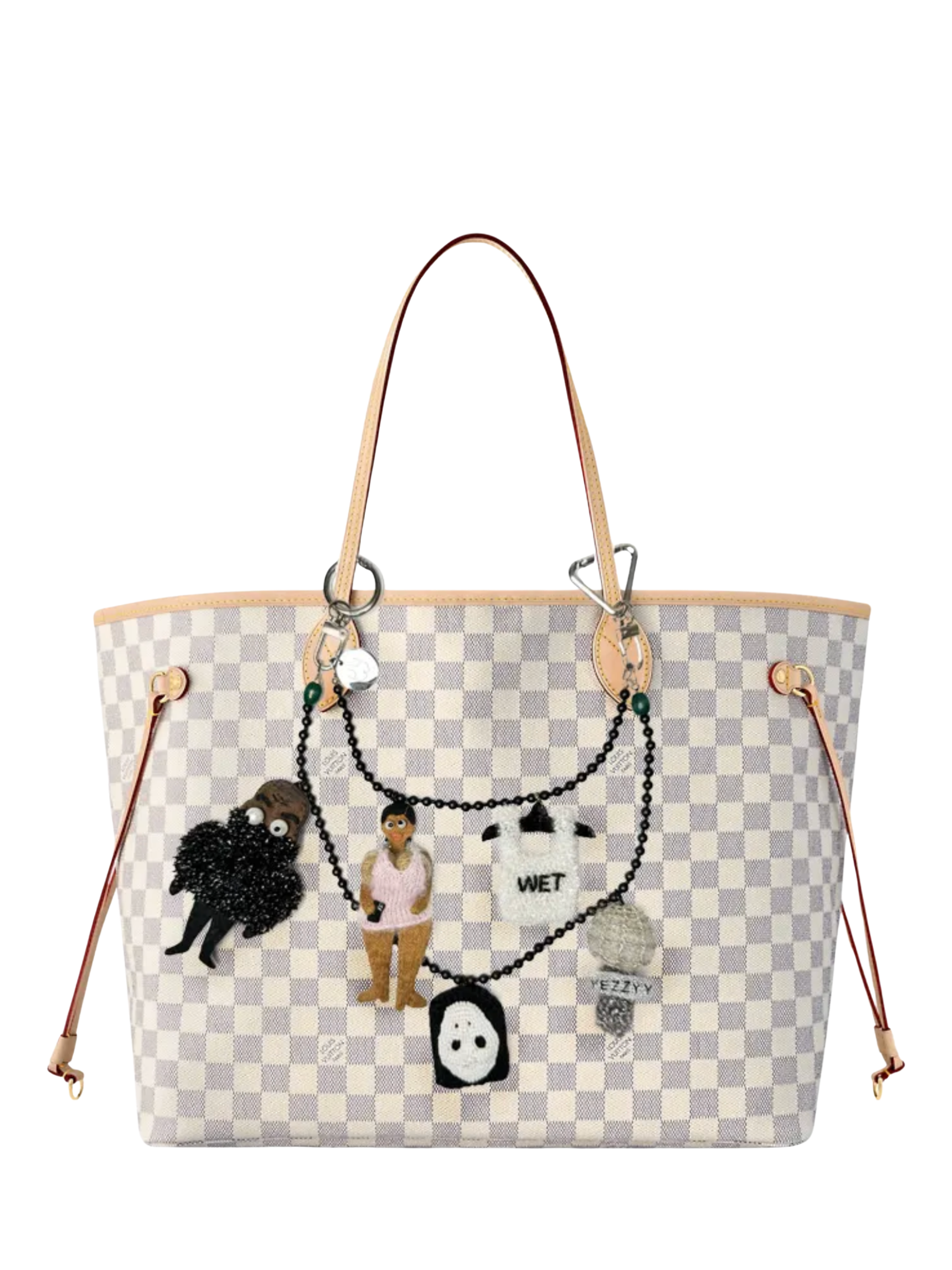 Pink Bibi doll bag charm styled on a handbag